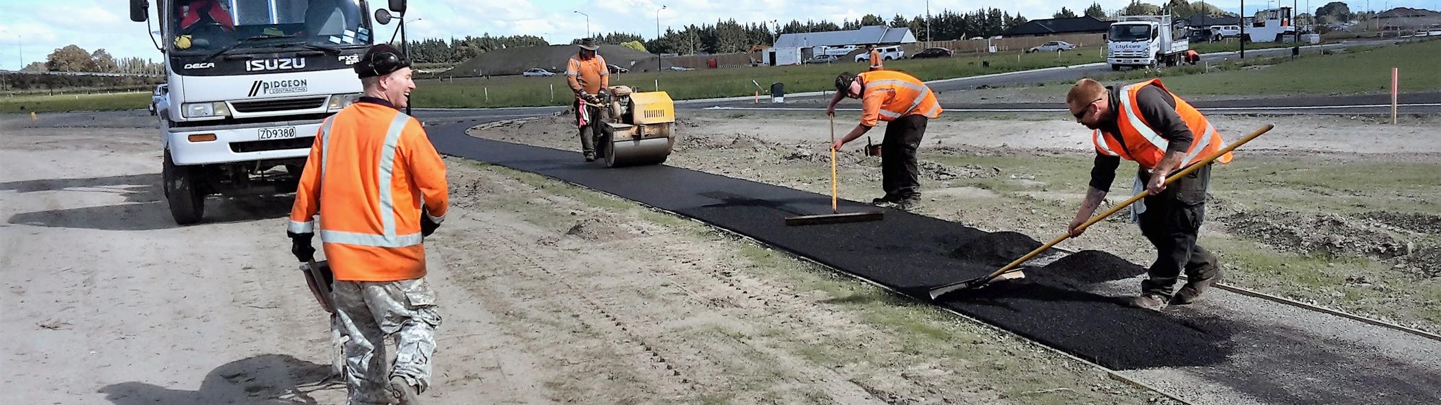 Pidgeon Contracting crew completing asphalt work
